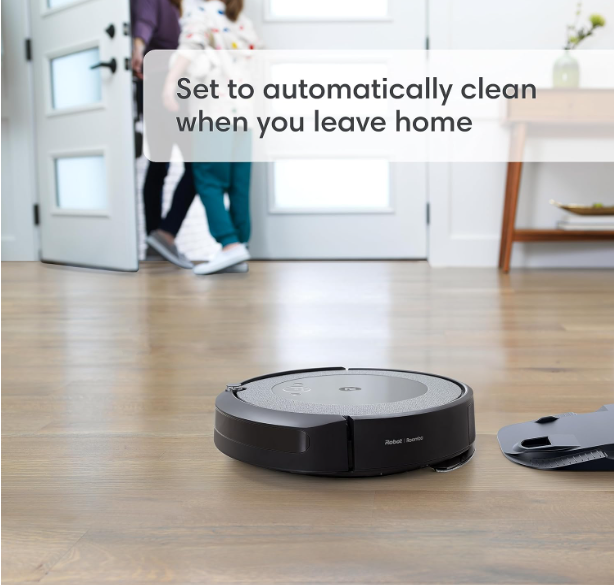 iRobot® Roomba Combo™ i5 Robot Vacuum and Mop cleaning a hardwood floor, showcasing its dual functionality of vacuuming and mopping simultaneously